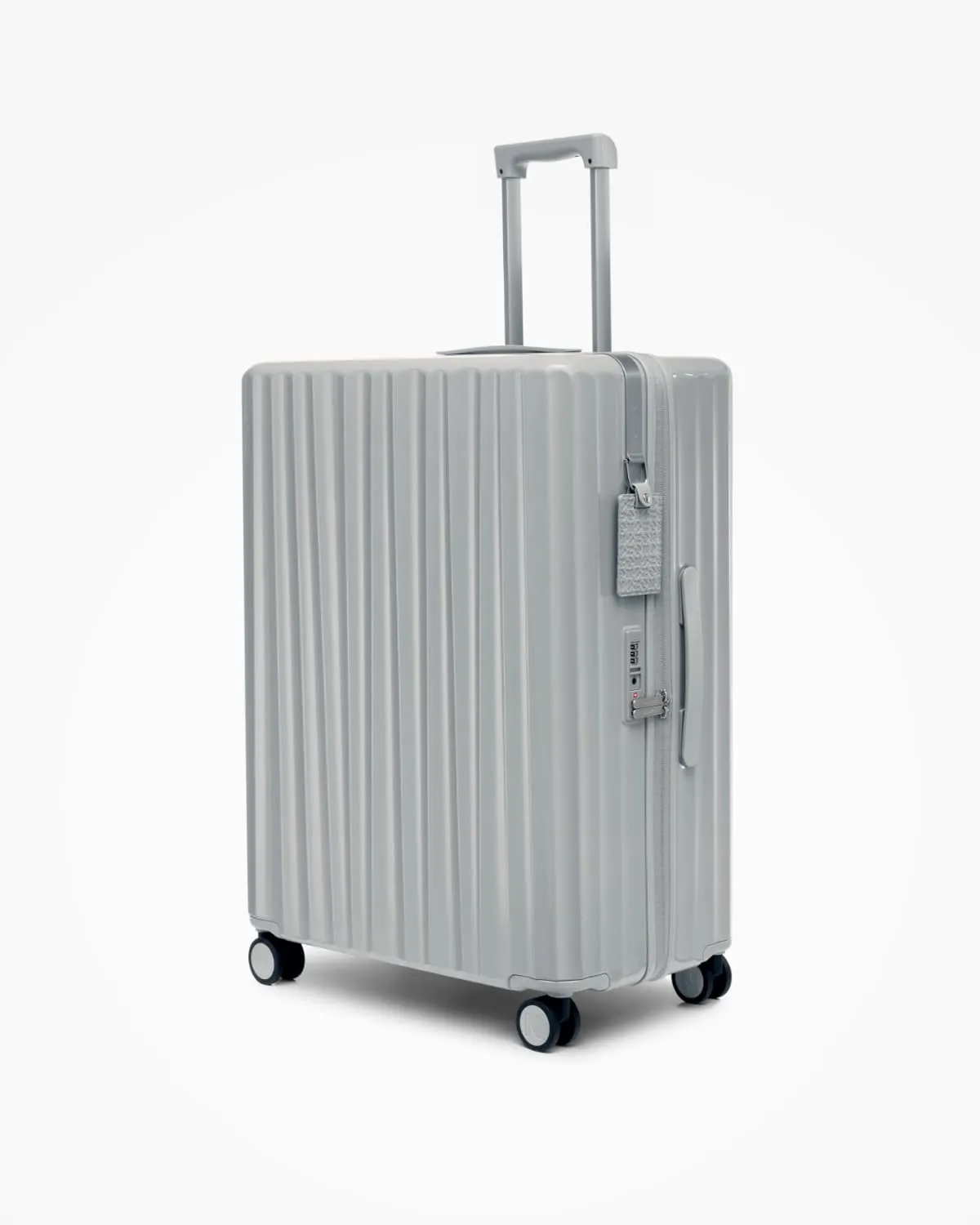 Nudient Bold Check-in L valigia Urban Grey rigida leggera