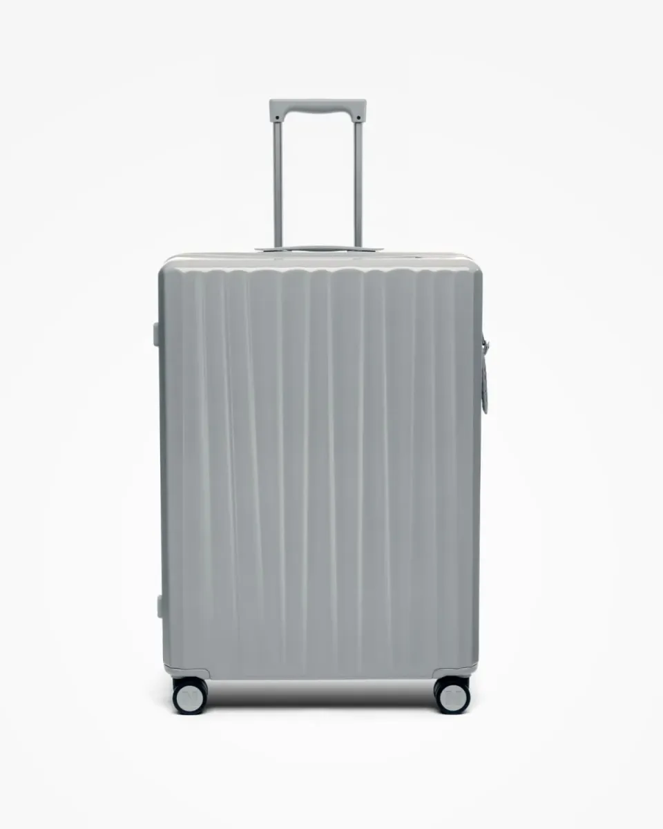 Nudient Bold Check-in L valigia Urban Grey rigida leggera
