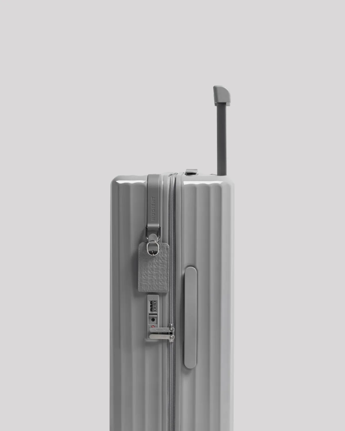 Nudient Bold Check-in M V2 trolley Urban Grey da stiva