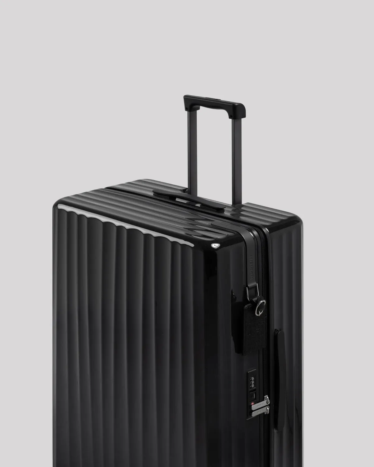 Nudient Bold Check-in V2 valigia L Charcoal Black leggera