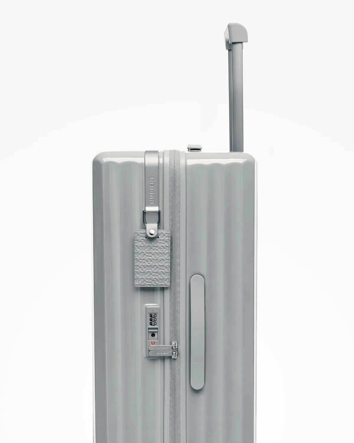 Nudient Bold Check-in L valigia Urban Grey rigida leggera